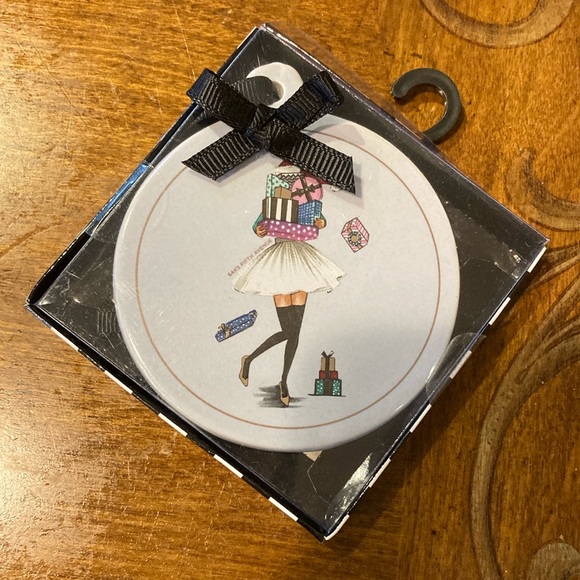 Saks Fifth Avenue round ceramic ornament with ribbon to hang. New in box. - Picture 1 of 4